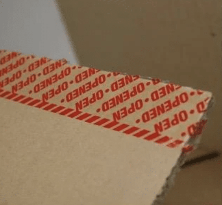 Standard Tape Tampertech tamper evident permanent automated box tape showing open message left on a carton after opening