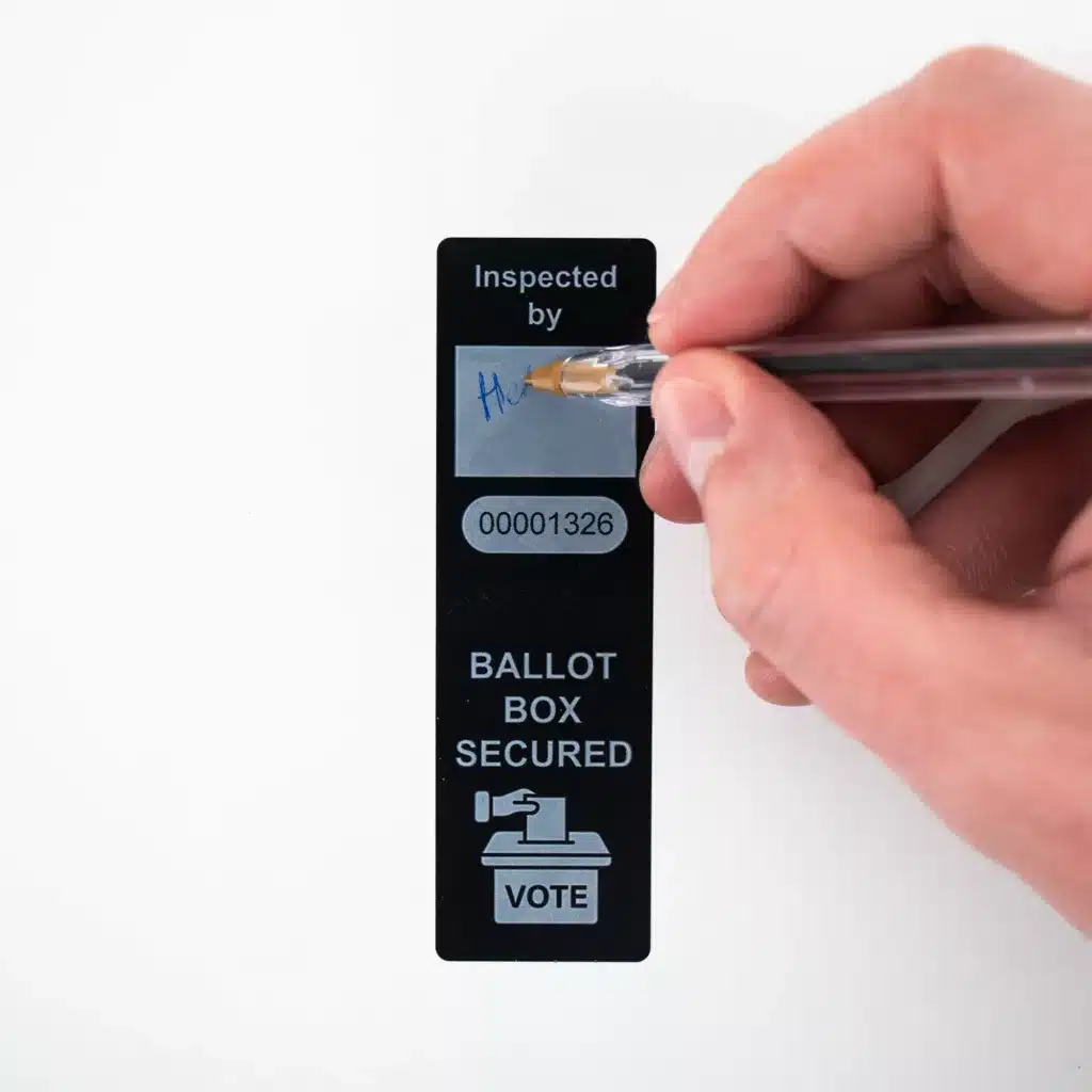 Close-Up of Tampertech Secure Ballot Box Tamper-Evident Label Being Written On