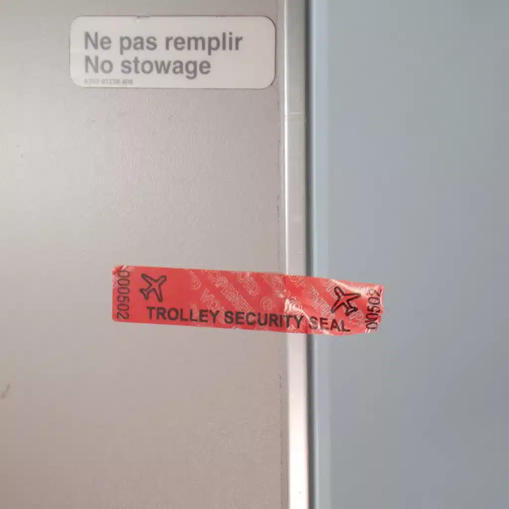 Removed and Voided Tamper-Evident Aircraft Trolley Security Seal