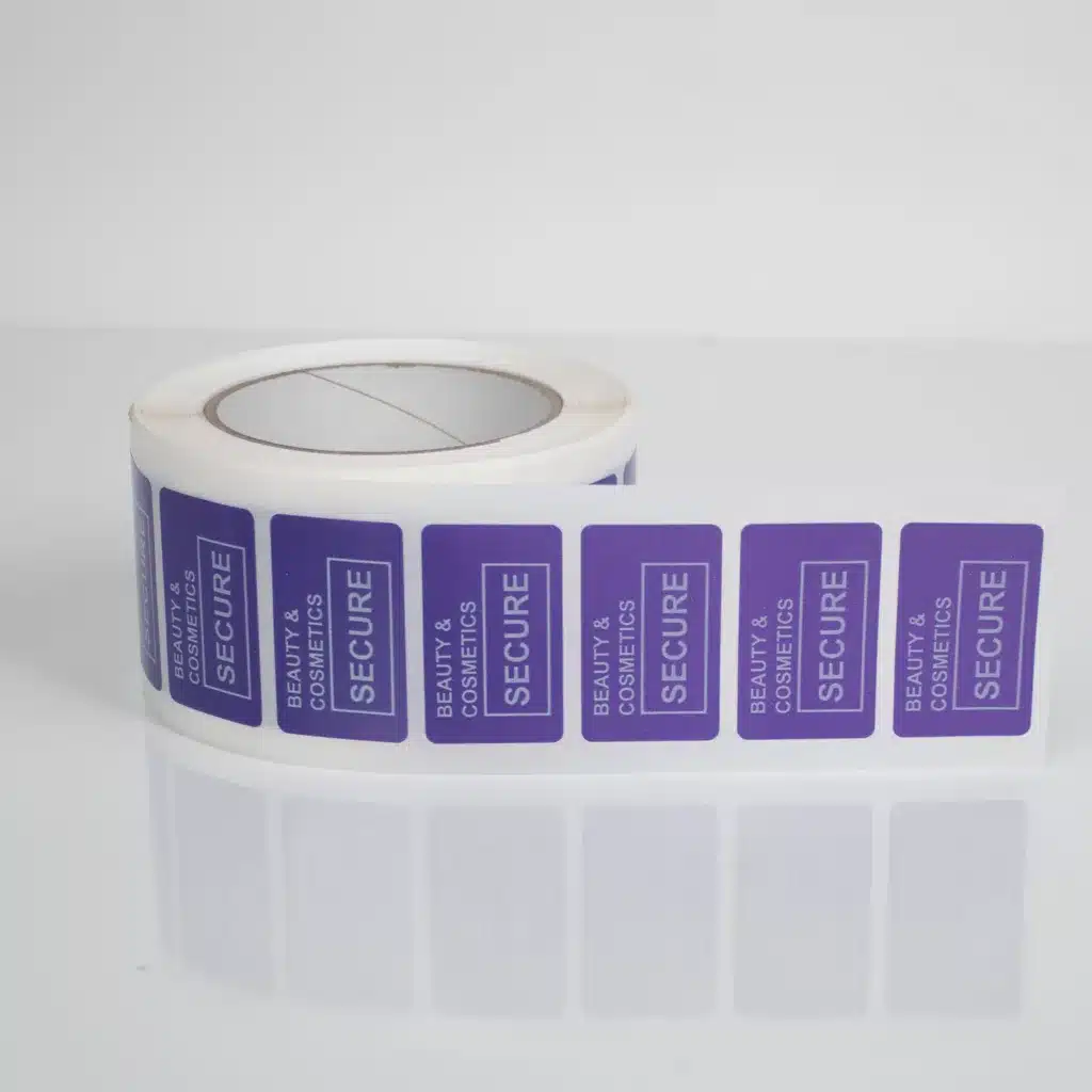 Skincare Packaging Roll of Tampertech Beauty & Cosmetics Purple Labels - 30mm x 50mm for Inner Box Packaging