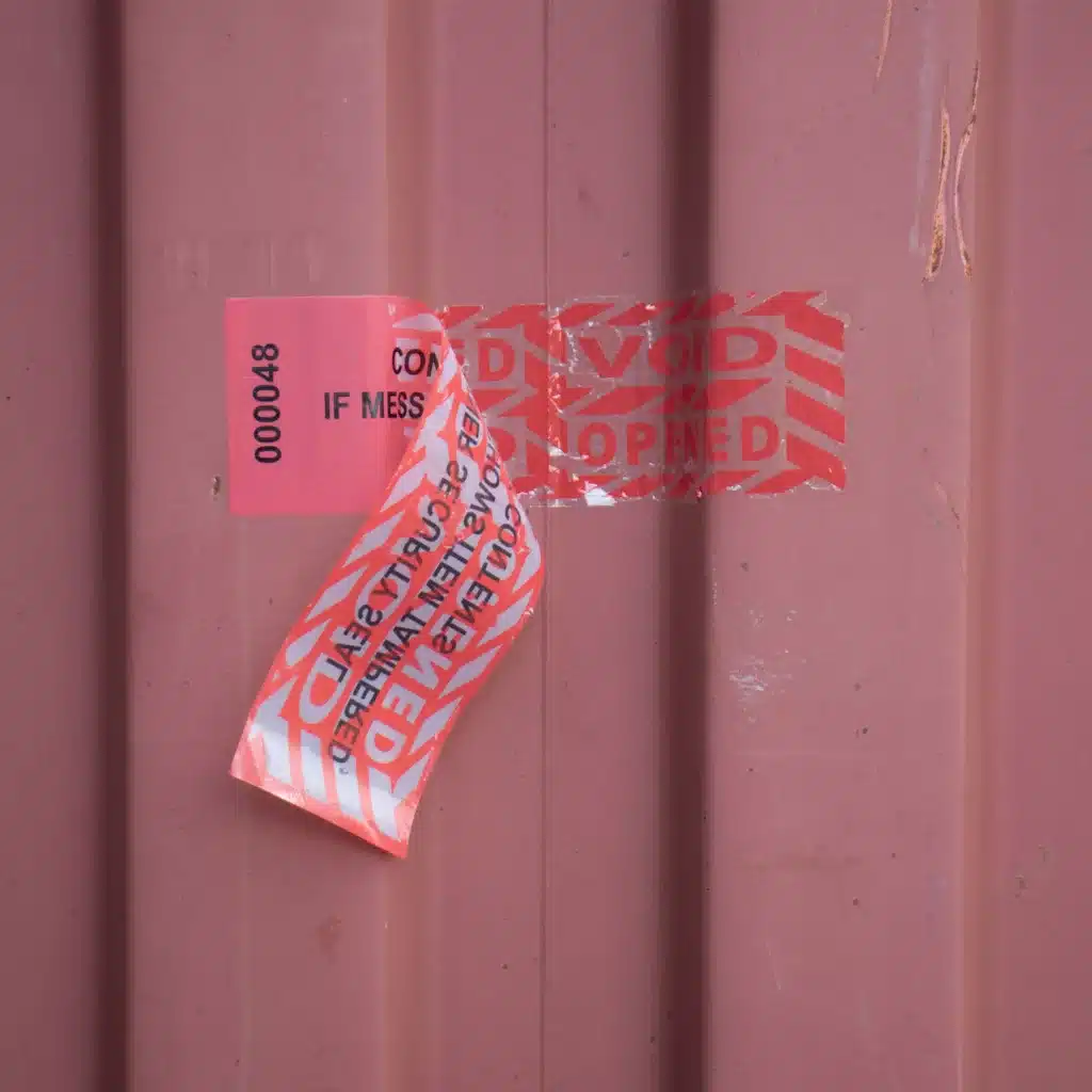 Image of a tamper evident Container Secure label showing the void after being removed.