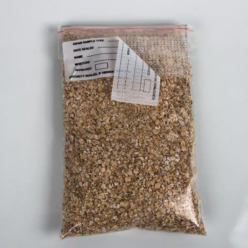 Partially Removed Tamper-Evident Grain Sample Label - 'OPENED OPENED' Void Message - Tampertech Security Solutions