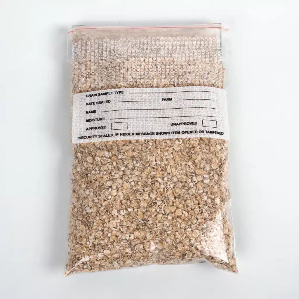 Removed Tamper-Evident Grain Sample Label - 'OPENED OPENED' Void Message on Bag and Label After Removal