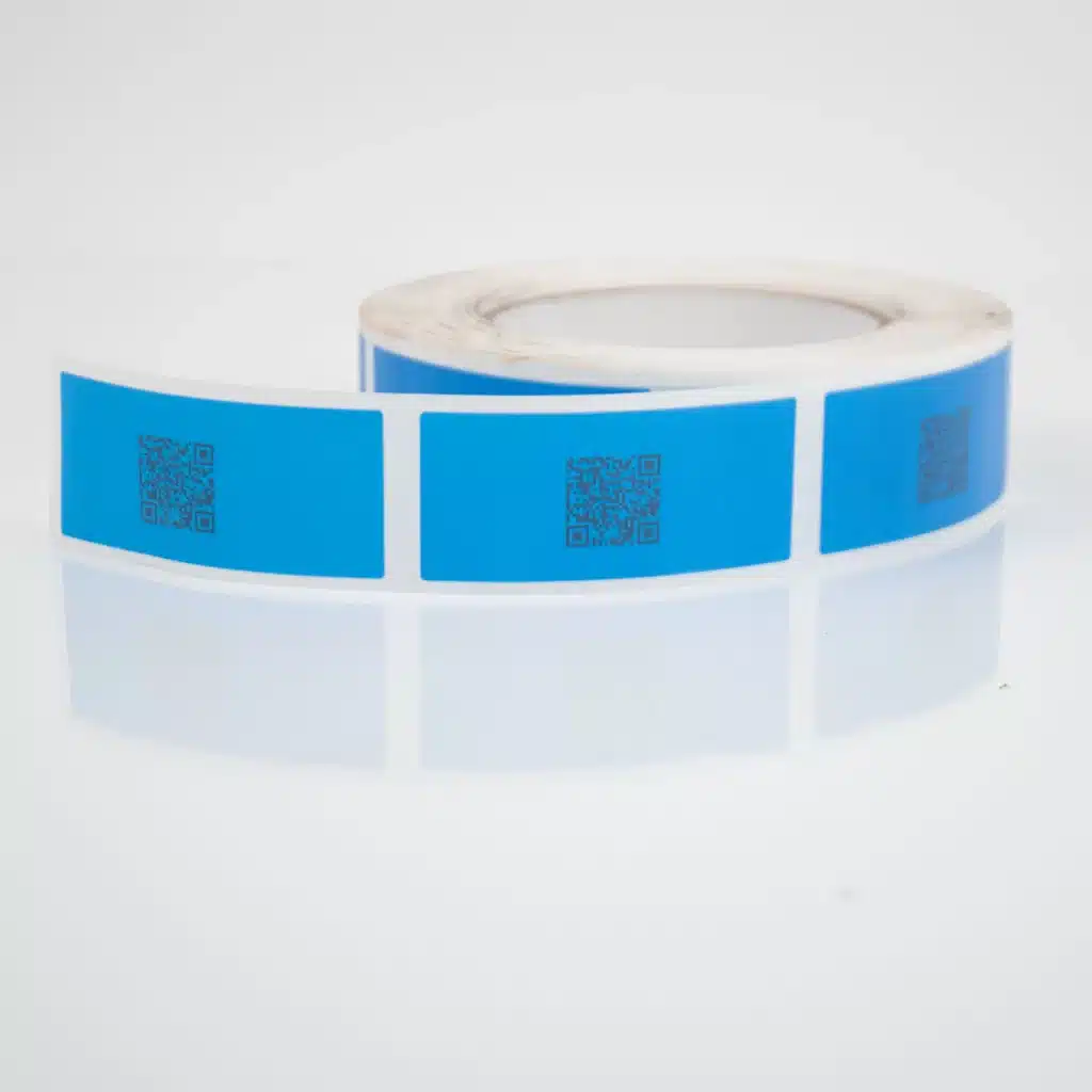 Image of a roll of blue Tampertech Cold Chain Secure Labels, 70mm x 30mm, on a roll of 500.