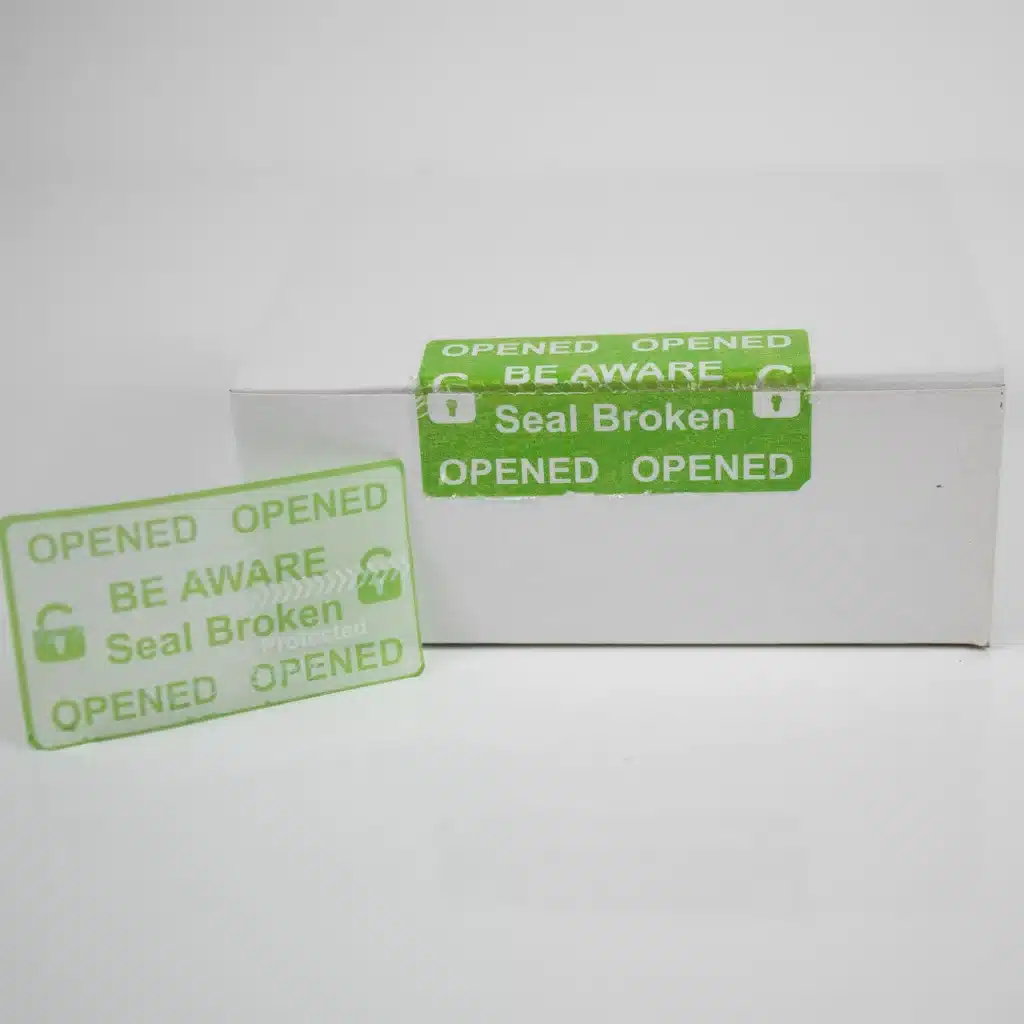 Image of green permanent Tech Secure tamper evident label from Tampertech fully removed demonstrating the permanent void message.